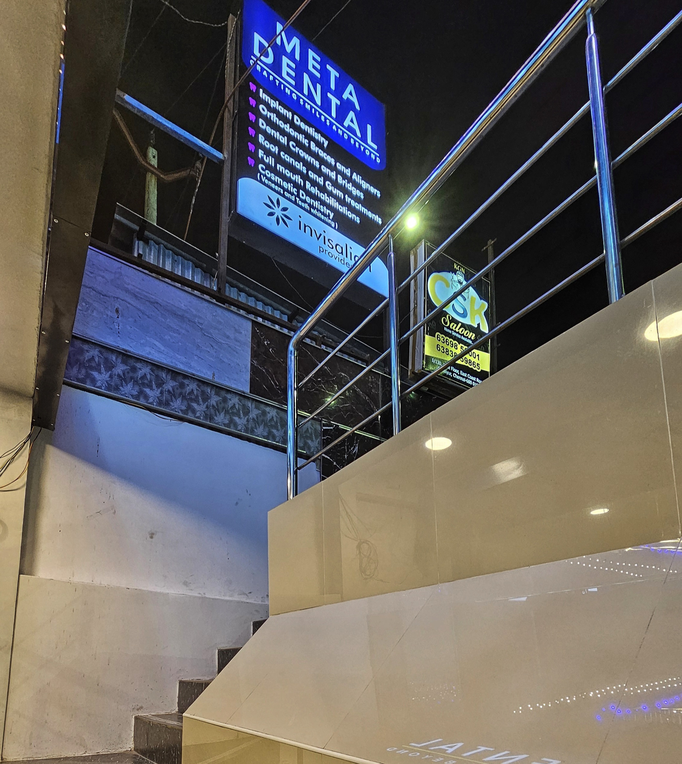 META DENTAL exterior at night